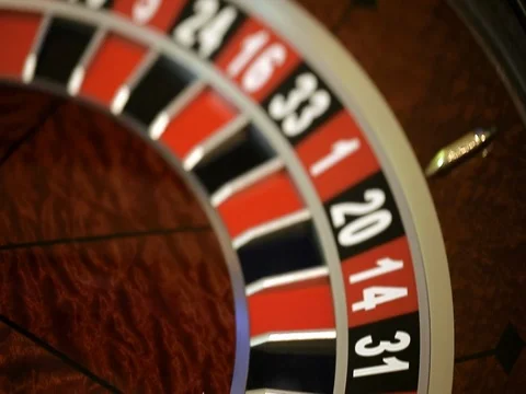 Roulette wheel running and stops with white ball on 22 close-up Vidéo 74223538