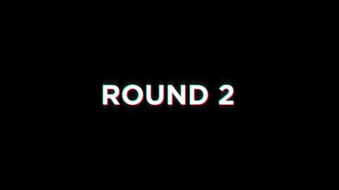 Round 2 animation of looped text glitch video game screen effect Stock Footage 313060829