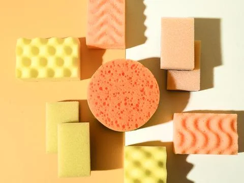 Round and rectangular foam rubber sponges. Top down view to abstract geometric Stock Photos