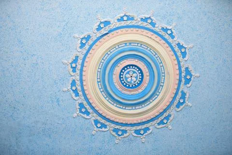 Round beautiful stucco pattern on the ceiling. Relief plaster, relief pattern Stock Photos