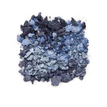 Round blue crashed eyeshadow for make up as sample of cosmetics product isola Stock Photos