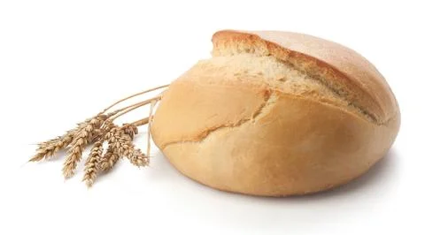 Round bread and wheat Stock Photos