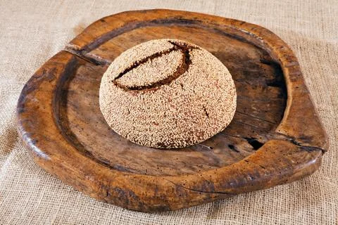 Round bread with seeds Stock Photos