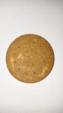 Round brown biscuit isolated Stock Photos