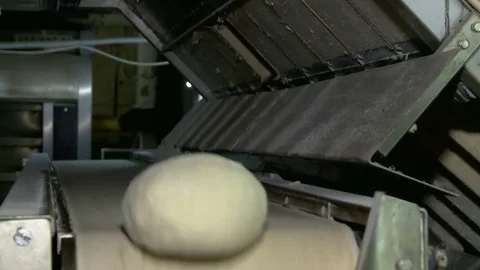 Round buns billets move along a conveyor Stock-Footage 73699358