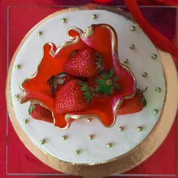 Round cake with a berry. Stock Photos