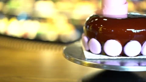 Round cake with pink oreo Stock Footage 167589519