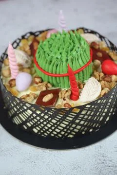 A round cake sits on a flat surface 写真素材