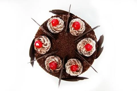 A round cake sits on a white surface 写真素材