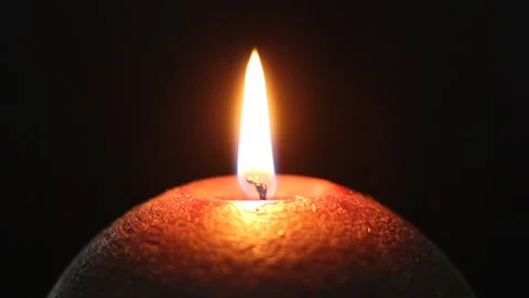 Round candle on black background. Stock Footage 131737573