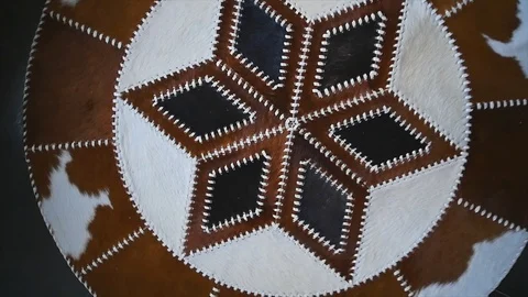 Round carpet made of cowhide leather Stock Footage 90359231
