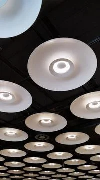 Round ceiling lamps with cold light Stock Photos