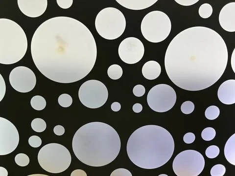 Round ceiling lights creating a modern and stylish atmosphere Stock Photos