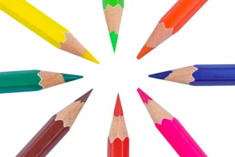 Round circle made with eight different colored wood pencil crayons on a paper Stock Photos