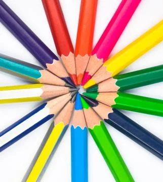 Round circle made with many different colored wood pencil crayons on a paper Stock Photos