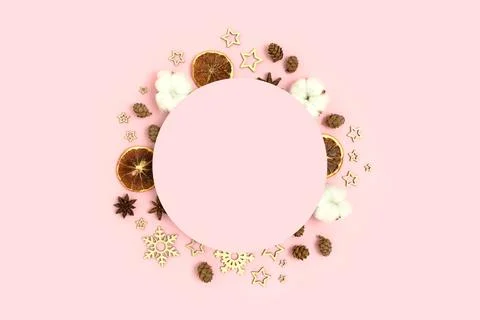 Round clean mockup with frame made of natural Christmas decoration. Stock Photos