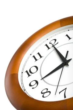 Round clock showing nine isolated Stock Photos