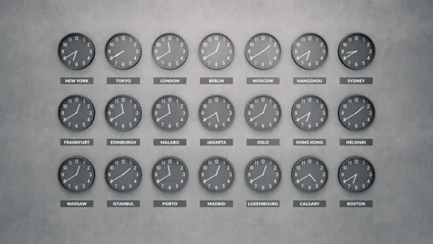 Round clocks show different time zones on a dark concrete wall. 動画素材 95006877