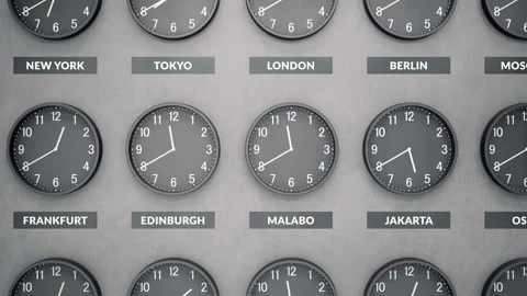 Round clocks show different time zones on a dark concrete wall. 動画素材 95007312