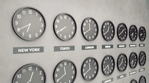 Round clocks show time in different cities on white dark concrete wall. 動画素材 95037946
