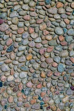Round cobblestone decorated wall Stock Photos