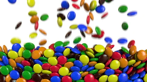 Round colored candies are falling. Alpha channel. 3D rendering Видео 100012720