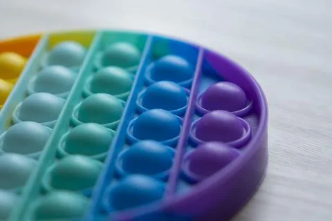 Round colorful multi-colored popIT antistress Stock Photos