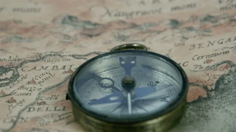 A round compass with its pointer moving Stock Footage 49442373