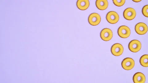 Round cookies biscuits blinking on right side of purple theme. Stop motion Vídeo Stock 169301319