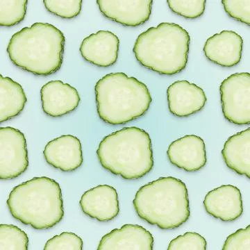 Round cucumber slices on light blue background, pattern design Stock Photos