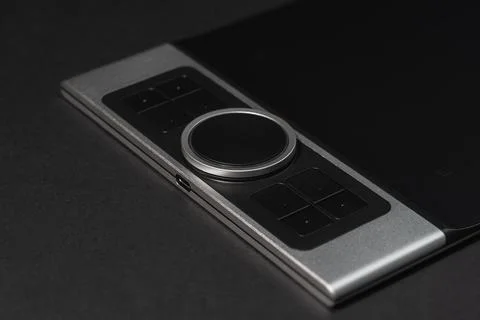 Round Dial Studio edit device with buttons on dark background. Stock Photos