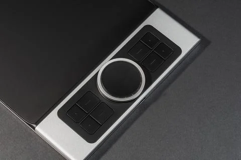 Round Dial Studio edit device with buttons on dark background. Stock Photos