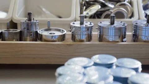 Round die molds of different sizes for badge maker and button making machine Stock Footage 101258507