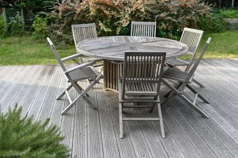 Round Dining Table with Chairs, garden furniture dining set. Stock Photos