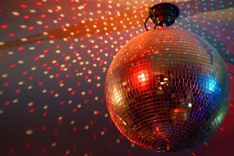 Round disco ball, light reflections on a ceiling Stock Photos