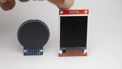 Round display module and rectangular tft lcd screen for electronics Stock Footage 345885426