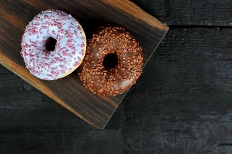 Round donuts-on a dark background Stock Photos