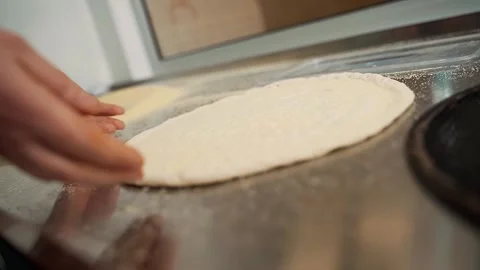 Round dough for pizza making Stock Footage 240641177