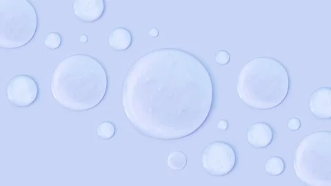 Round drops of transparent gel serum on pastel background Stock Footage 204717852