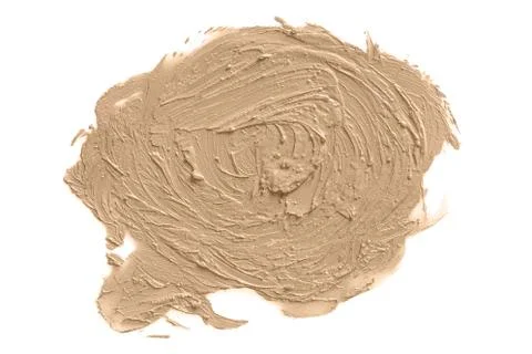 Round face make-up solid creme foundation sample on a white background Stock Photos