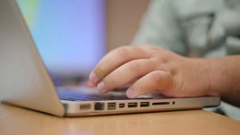 Round fat hand using laptop Stock Footage 89617726