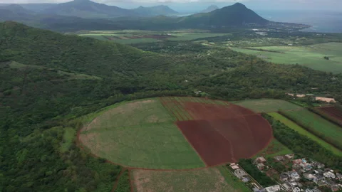 Round fields. Drone camera moving close to the tea plantation with mountain Video stock 171768455
