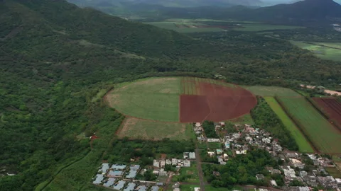 Round fields. Drone camera moving close to the tea plantation with mountain Stock Footage 172054498