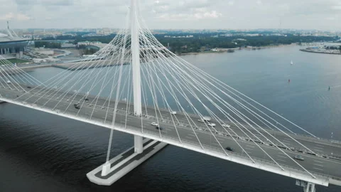 The round flight. The camera flies to a beautiful bridge with cars. Aerial shot Stock Footage 93213145