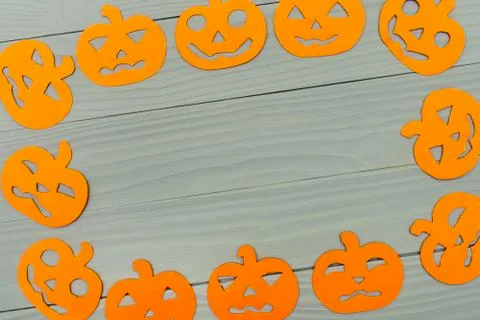 Round frame with different pumpkin paper silhouettes Stock Photos