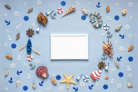 Round frame made of decorative items and miniature toys: seashells, seastars, Stock Photos