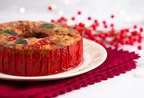 Round Fruit Cake with Cherries Pineapples and Nuts Elegant Platter Stock Photos