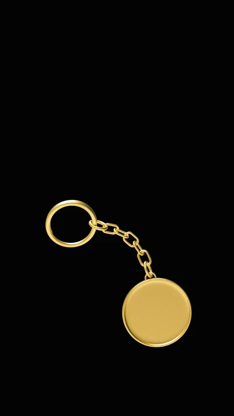 Round golden keychain on black background in 3D render. Stock Footage 338227062
