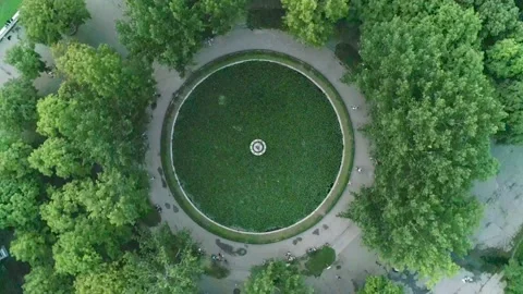 Round  green pool in the park Stock Footage 137697871