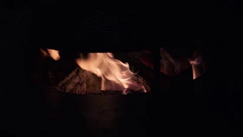 Round grill grill. Fire burns below. Around dark. Stock Footage 112615418